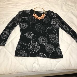 Black and white V-Neck blouse.